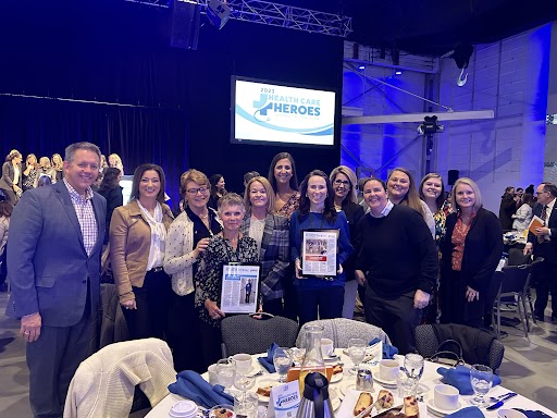 Paws and Think volunteers and staff receiving the 2023 Health Care Hero by Indianapolis Business Journal!